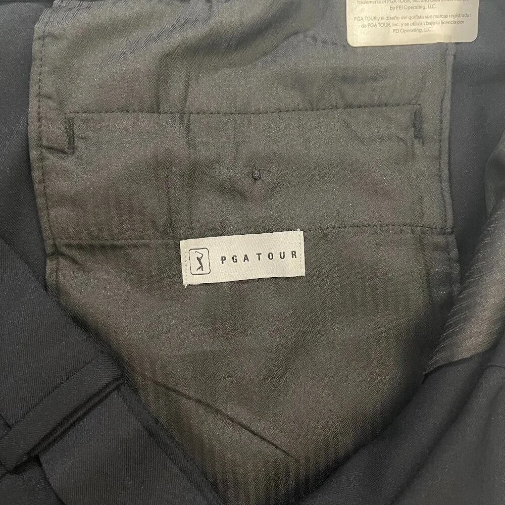 PGATOUR. Black golf shorts size 44. Made in Bangladesh. 100% Polyester.